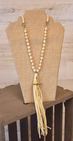 Cream Suede Tassel and Wood Bead Cross Necklace
